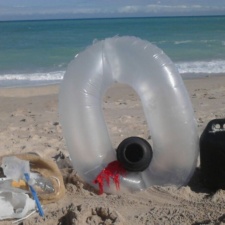 Beach Debris Balloons, boat debris and plastic crap on beach