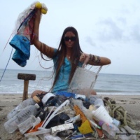 balloons, plastic, a hammer and rope cleaned from beach