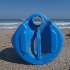 Plastic Pollution Blue Plastic Container on BeachBlue Plastic Container on Beach