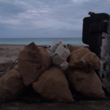 Beach Cleanup Burlap Bags filled with beach debris