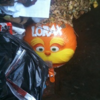 Mylar Lorax balloon polluting beach