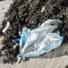 Balloon Pollution mylar balloon on beach