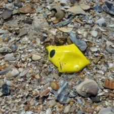 Nothing to "smile" about Piece of Smile balloon littering beach