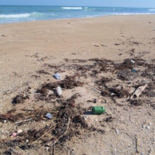 Plastic Lasts Forever Pile of plastic pollution on beach