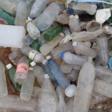 Plastic Pollution Pile of single-use plastic products trash on beach