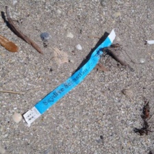 Plastic Band Skydive plastic band debris on beach