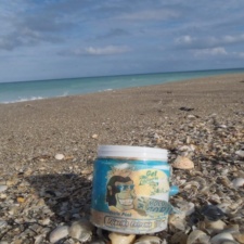 Plastic Pollution Venezuelan hair gel container trash on beach