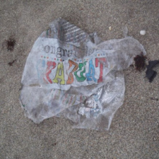 Congrats? mylar balloon on beach