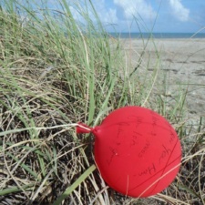 Latex balloon latex balloon with a note written on it