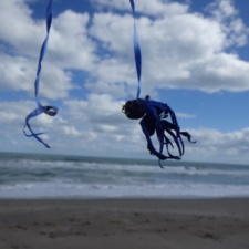 Latex Balloon latex balloons and ribbon litter on beach